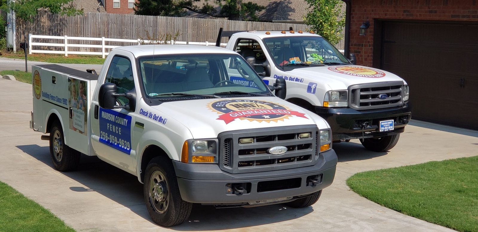Madison County Fence Co branded work trucks